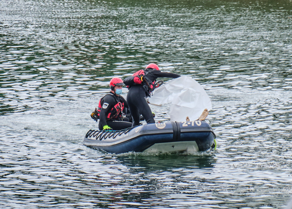 A body been rescue in a river by the emergency services.